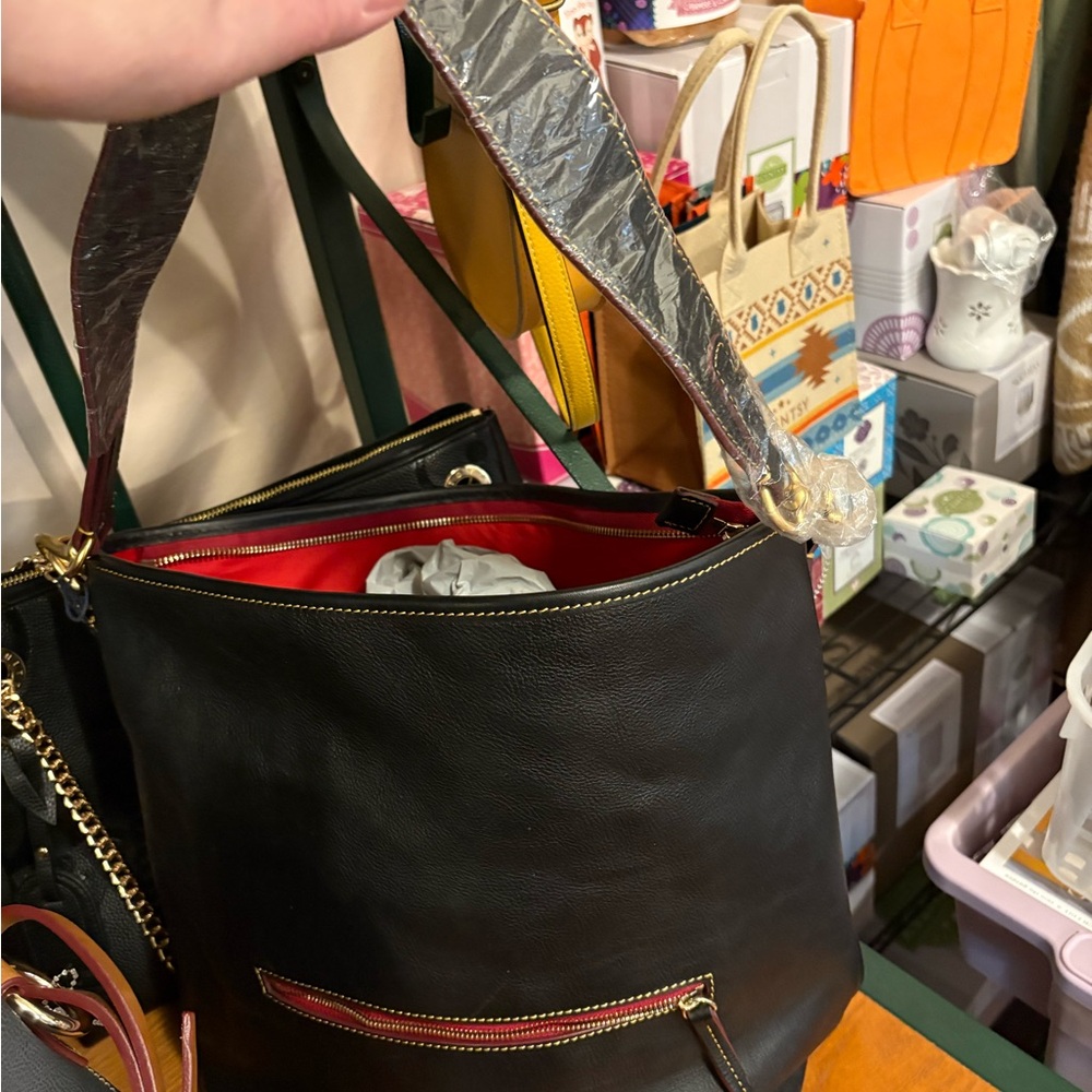 Dooney & Bourke Black Hobo Bag with Red Interior